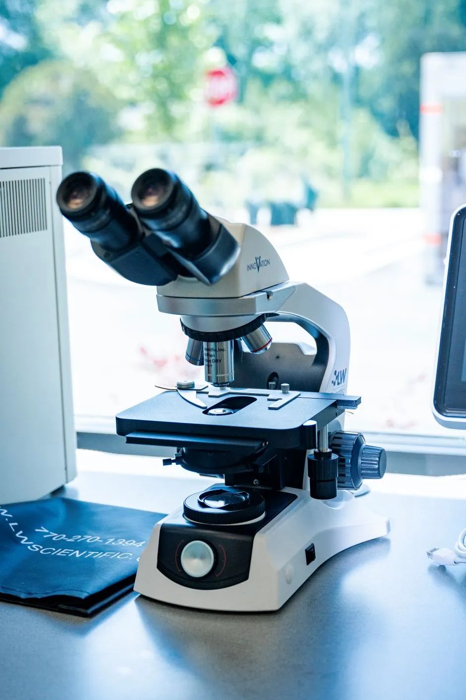 Microscope sitting in front of window