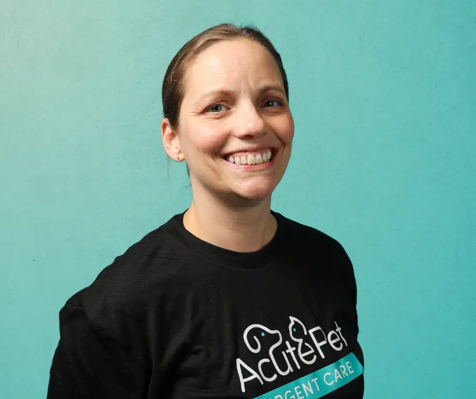 Beth Shull, DVM an Associate Veterinarian at AcutePet Urgent Care in Solon, smiling on a gradient teal background