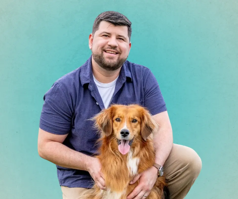 Cody Land, DVM with his dog, smiling on a teal background